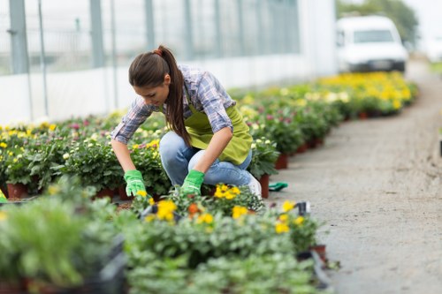Local gardener preparing tools at the start of a maintained garden in Erith